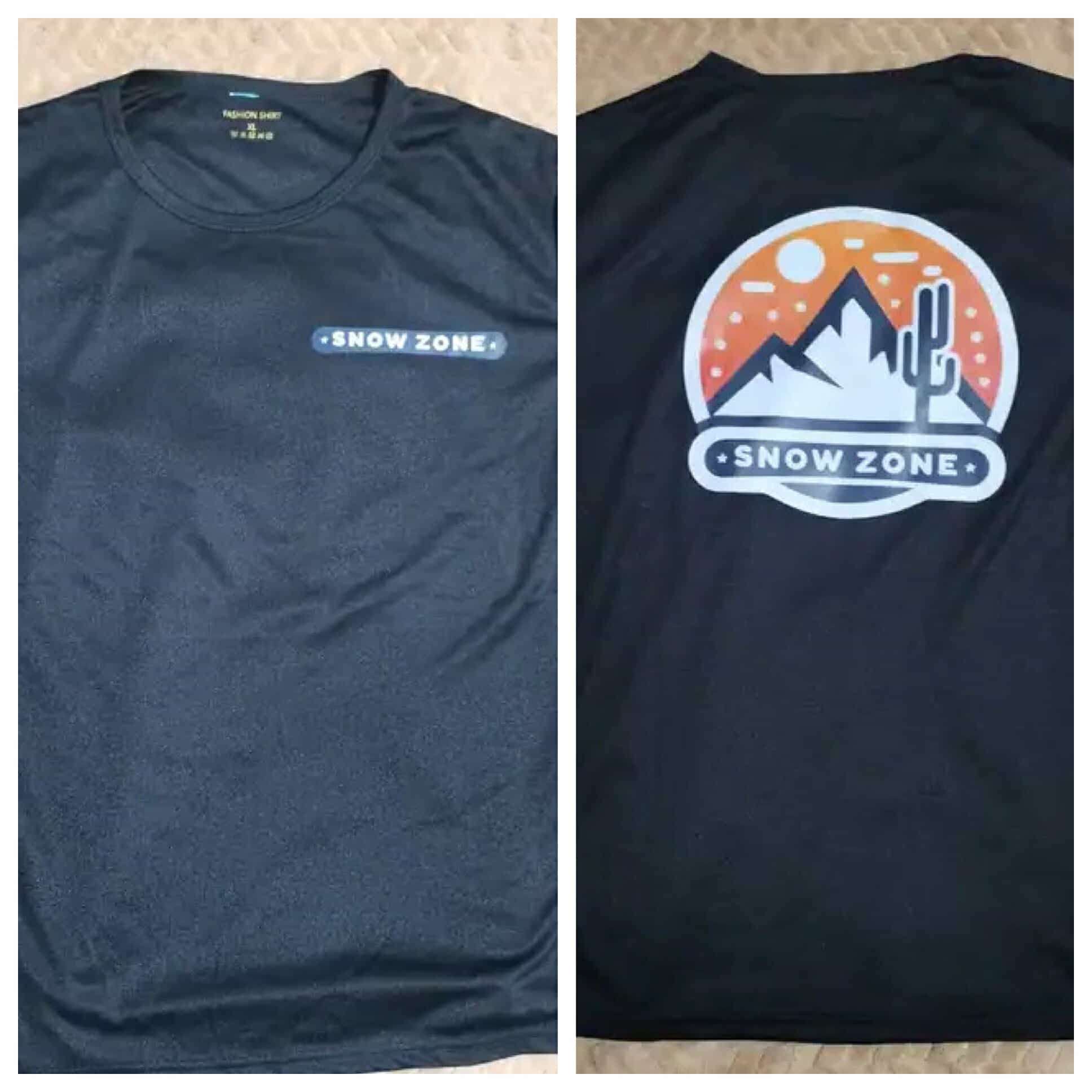 Black dry fit short sleeve shirt with Snow Zone logo on front and mountain design on back